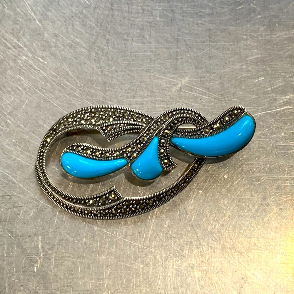 Silver brooch embellished with turquoise and marcasite